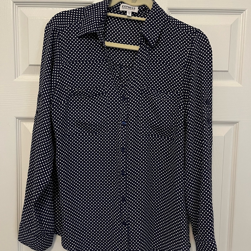 Navy and white polka dot women’s dress shirt from Express.